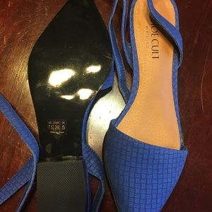Like new, never been worn blue flats.